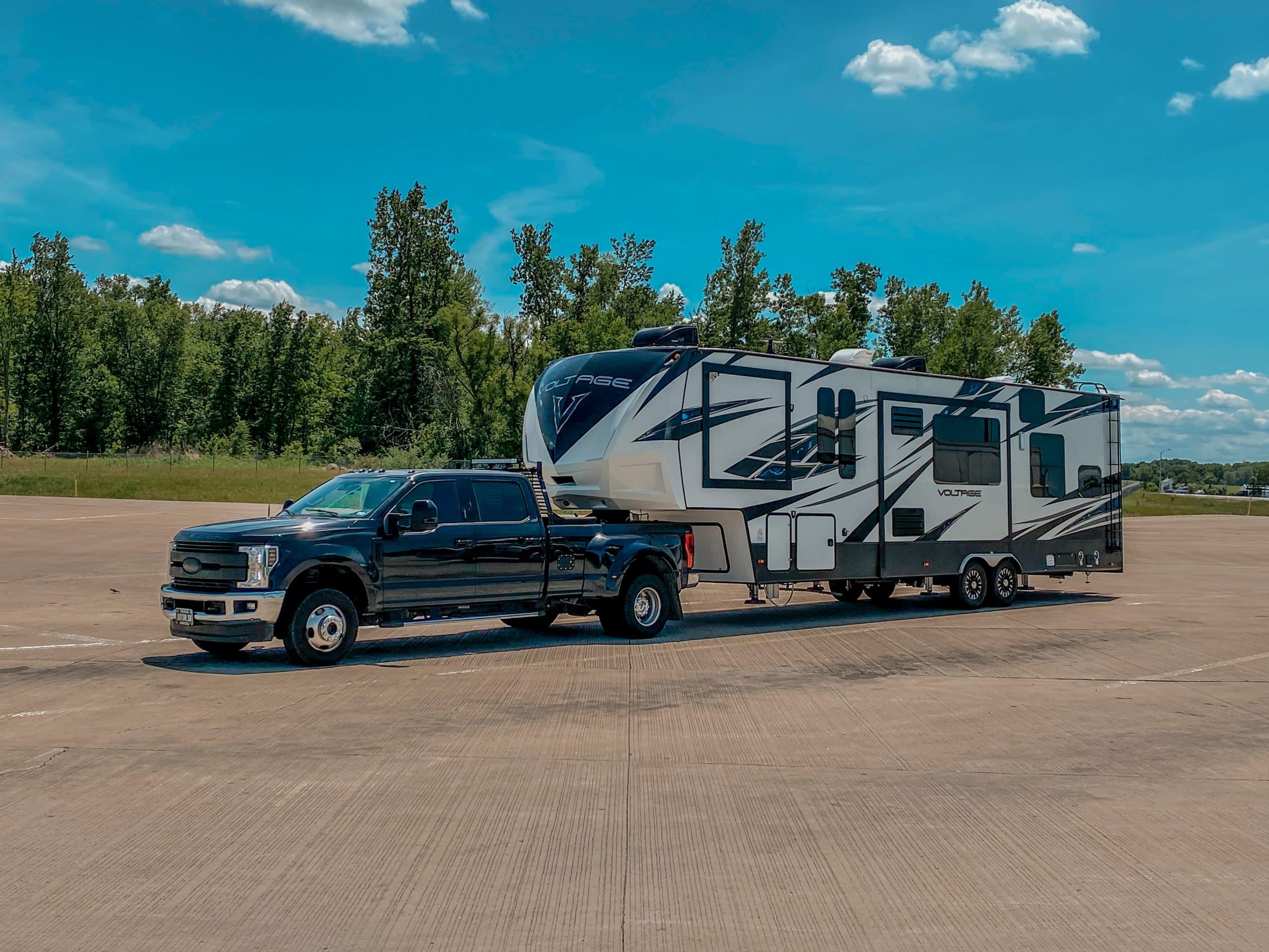 Truck and fifth wheel at rest stop area