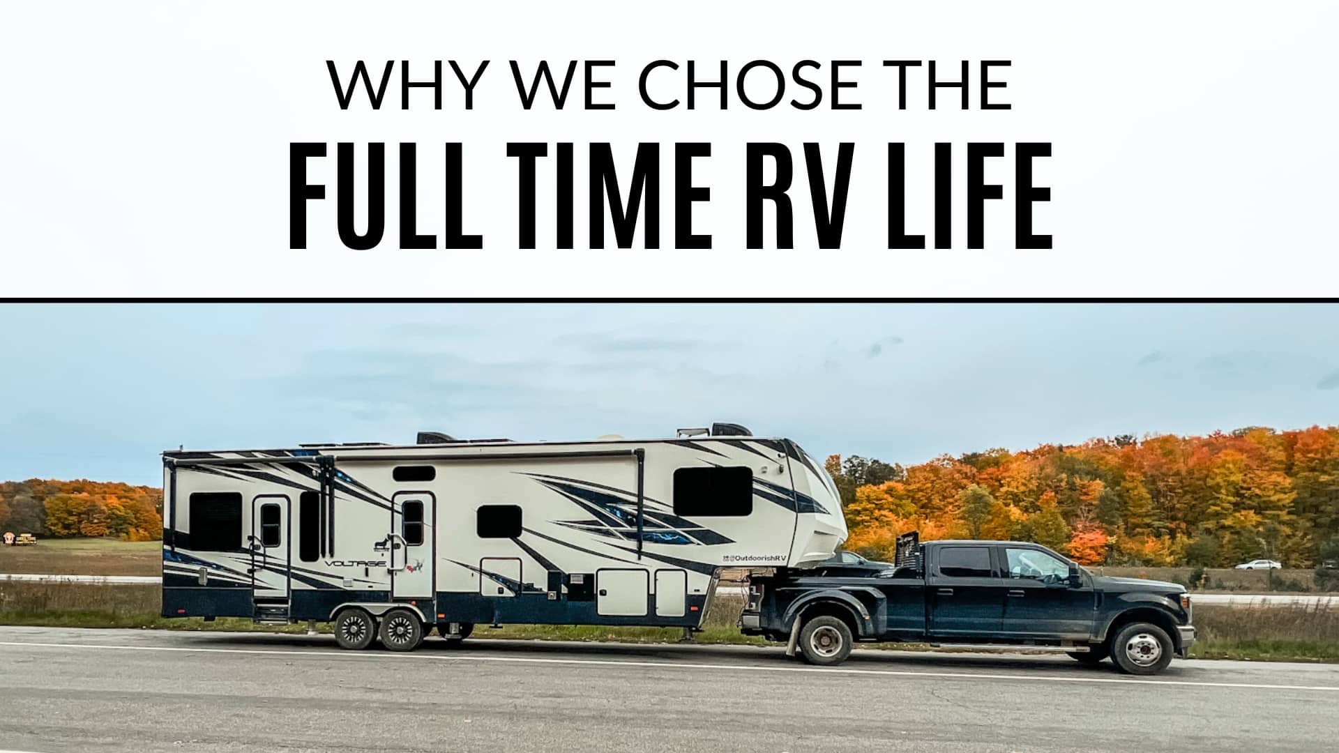 Black truck parked at rest stop towing a white fifth wheel. Highway in background with fall foliage on trees. Text on the image says "Why we chose the full time RV life"