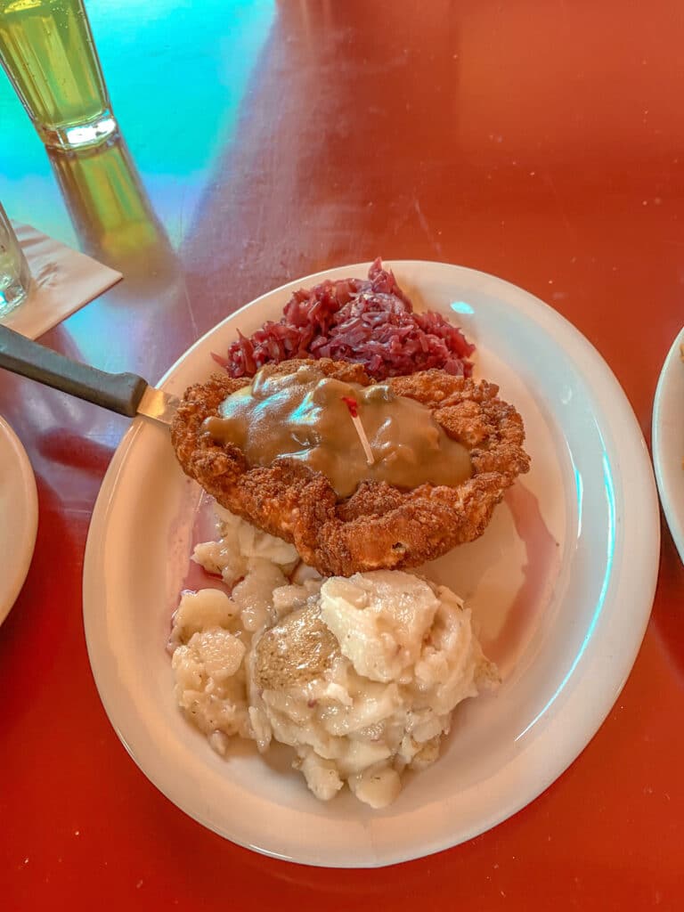 Schnitzel and cabbage with potato salad