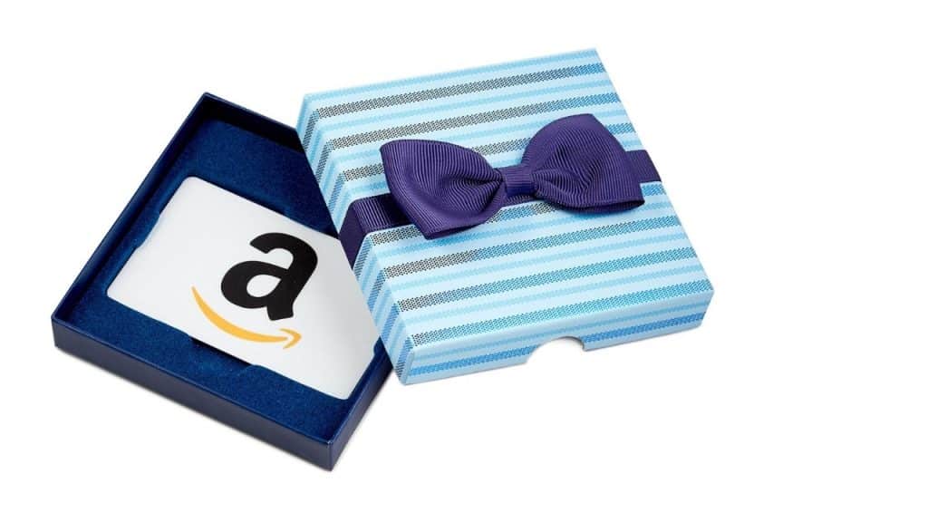 Amazon gift card in a blue box with bow