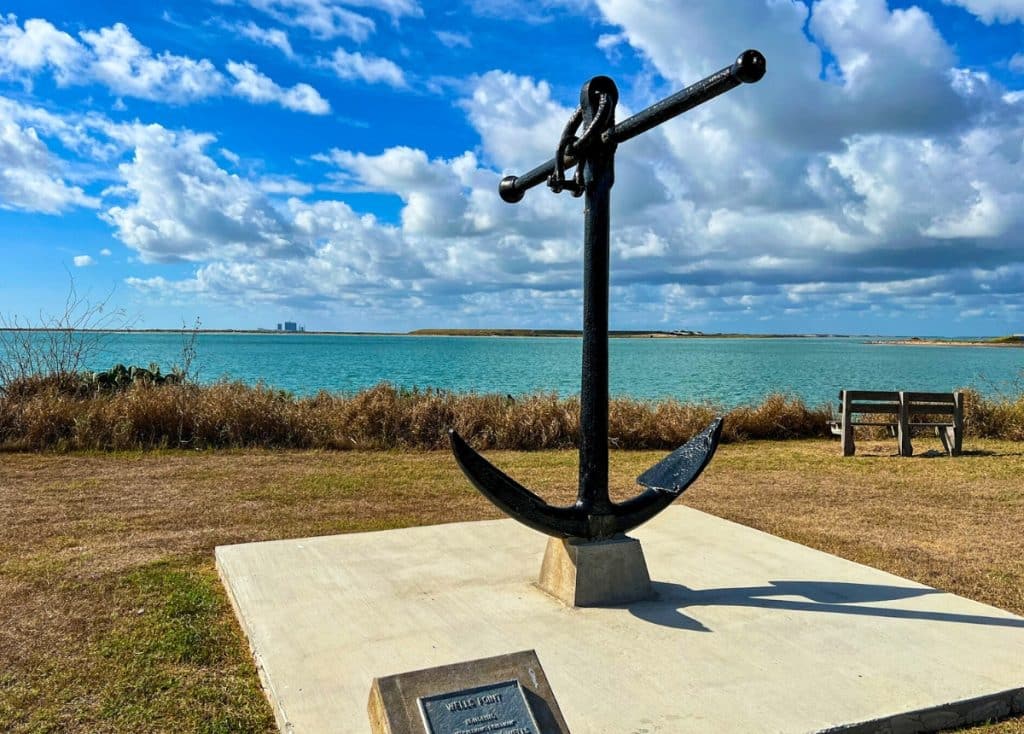 Anchor monument in front of the bay at Isla Blanca RV Park