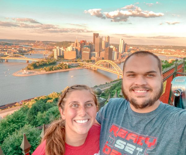 couple posing for photo at Pittsburgh overlook