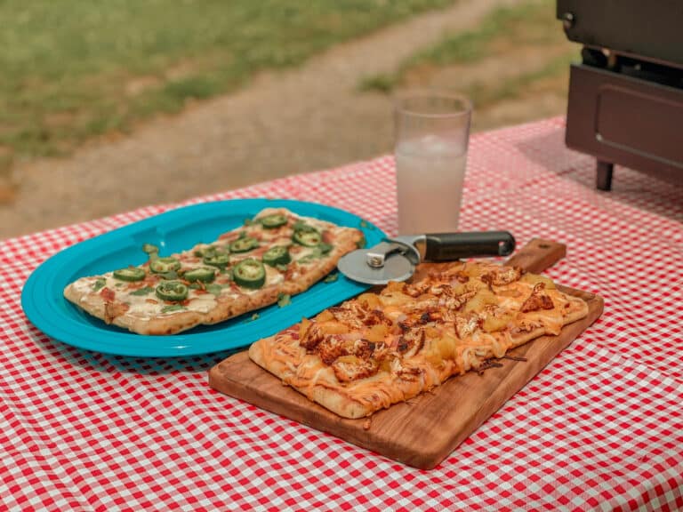 Jalapeno Popper and BBQ Chicken Flatbread Pizzas on picnic table with red and white checkered table cloth