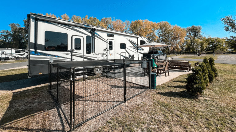 RV campsite with patio and onsite dog pen