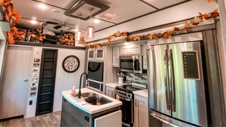 RV kitchen decorated with fall garland
