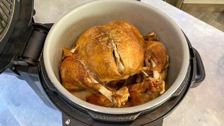 Cooked turkey pressure cooked and air fried inside a Ninja Foodi cooker