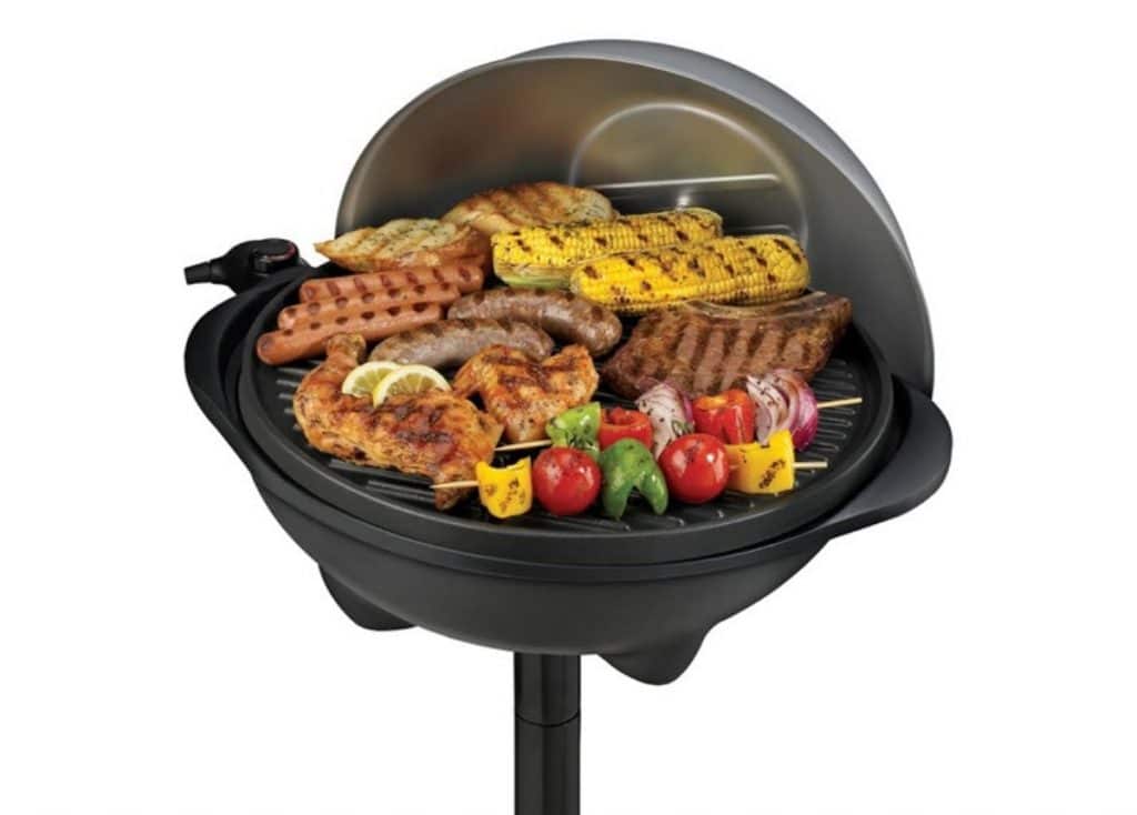George Foreman Electric Grill cooking a variety of food items