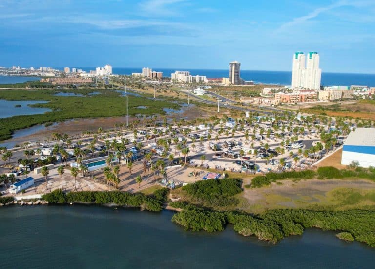 Aerial view of South Padre Island KOA and the island with ocean in the distance.
