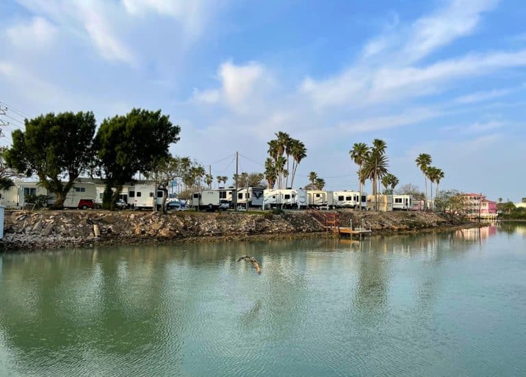RV campsites overlooking canal in Port Isabel, Texas.