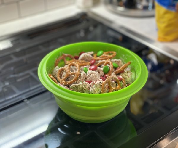 Green bowl filled with reindeer chow